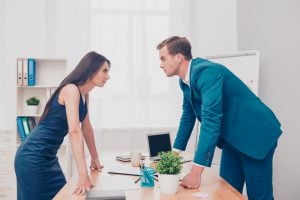 Man and women stare intently