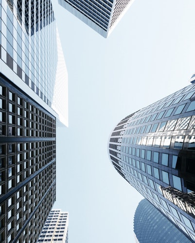 looking up at buildings